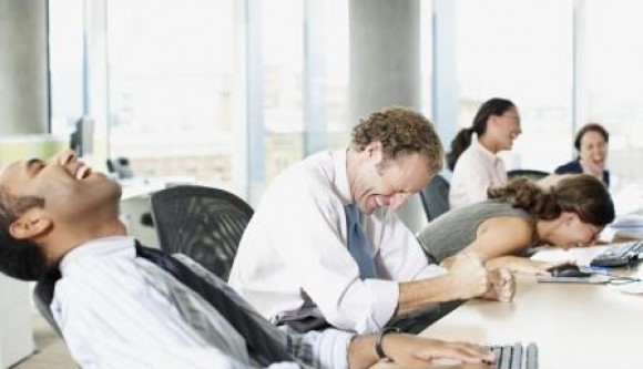 rex-business-people-laughing-in-office-580x333