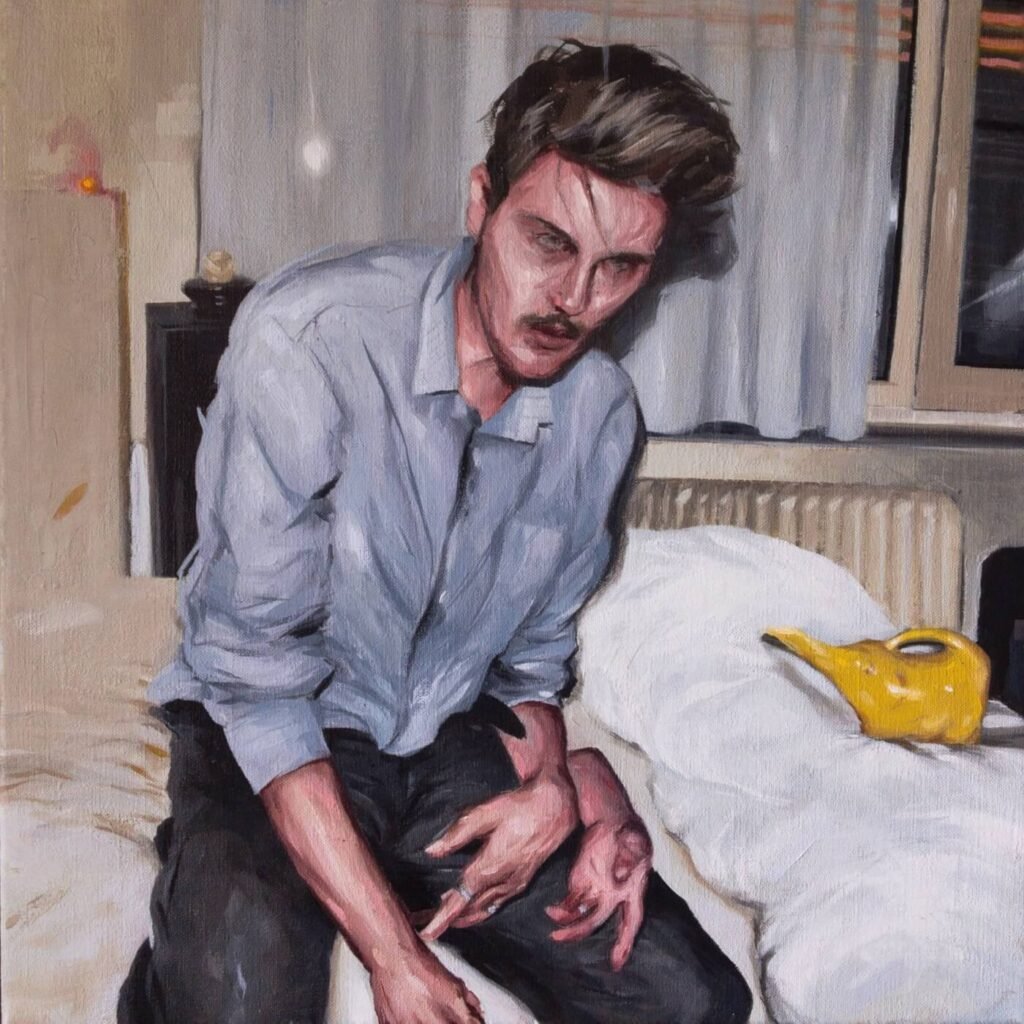 Autoretrato de Seppe De Meyere, en la habitación sentado en una silla. 